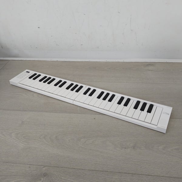 (Stock B) Piano 49 Touch White piano 49 touches pliable